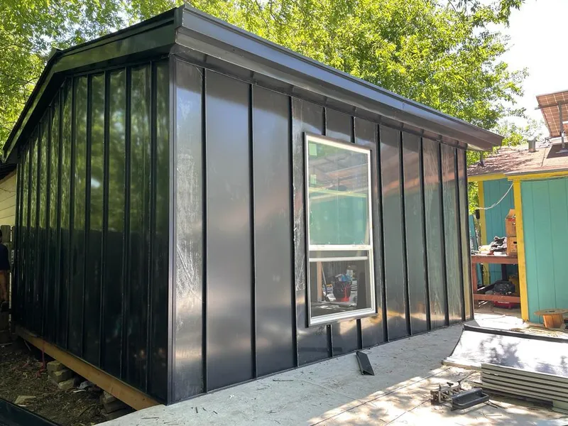 Black standing seam metal wall panels for Metal Roof Installation in Blanchard