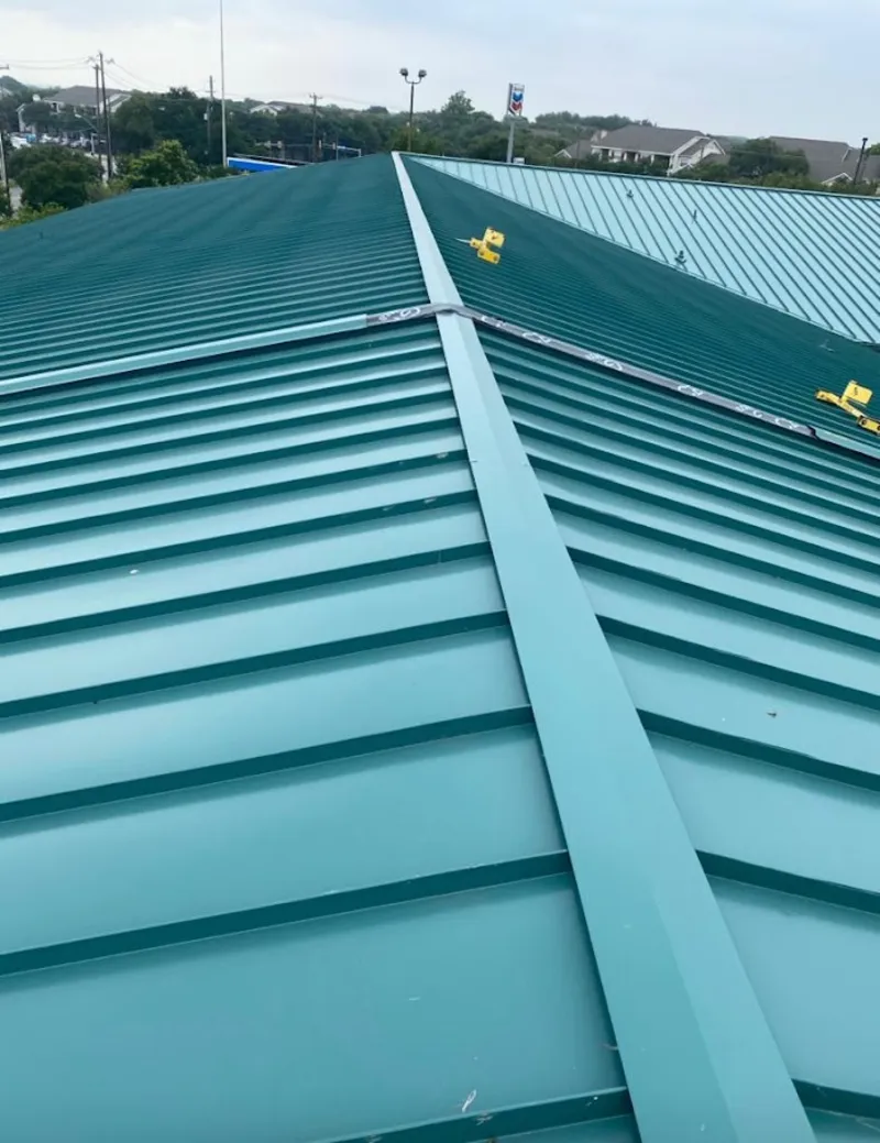 Green commercial metal roof ridge and valley for Metal Roof Repair in Blanchard
